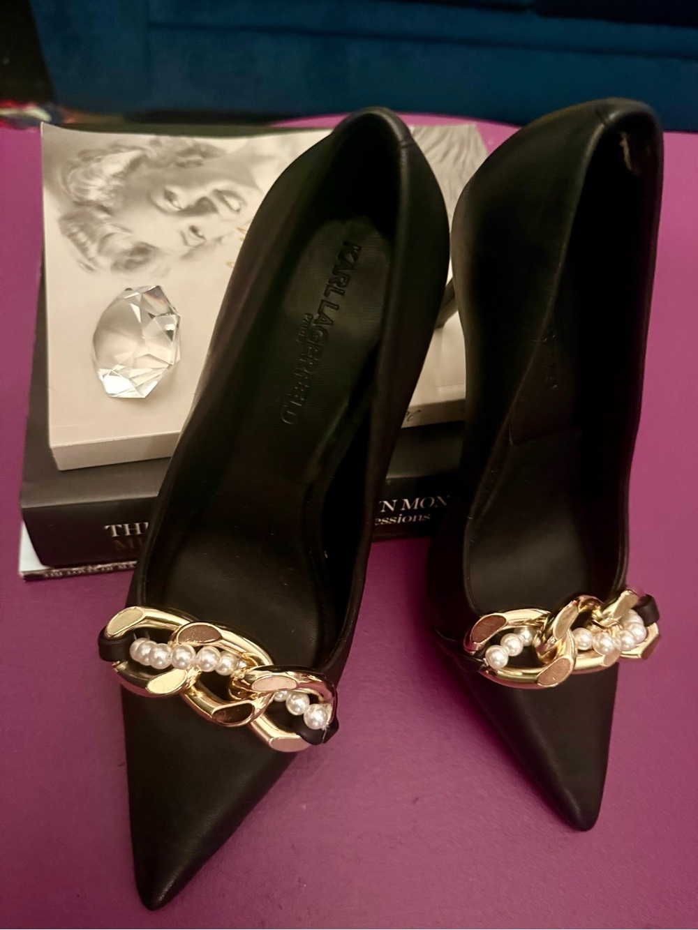 Karl Lagerfeld Black Pointed Toe Pumps with Gold Chain & Pearl Accents